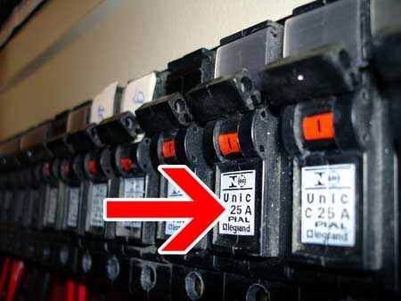 Check your circuit breaker box to see what Amps it can support, so you can figure out how many watts are safe to put on each circuit